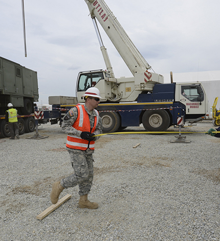 USACE personnel measuring area for a generator