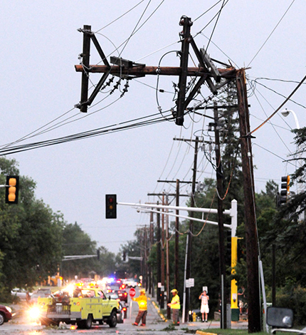 pic of broken poles with electric wires