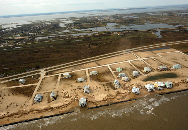 Waterfront homes and roads damaged by a storm surge from Hurricane Ike.