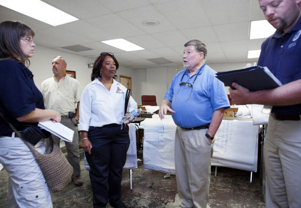 FEMA staff performing a site inspection.