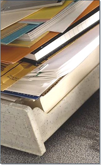 Stacks of papers and books 325x527 (jpg)