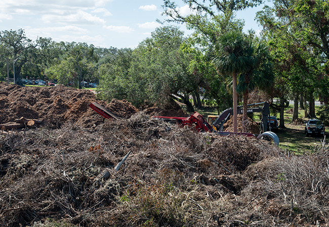 Piles of debris collected from Sanford, FL neighborhoods.