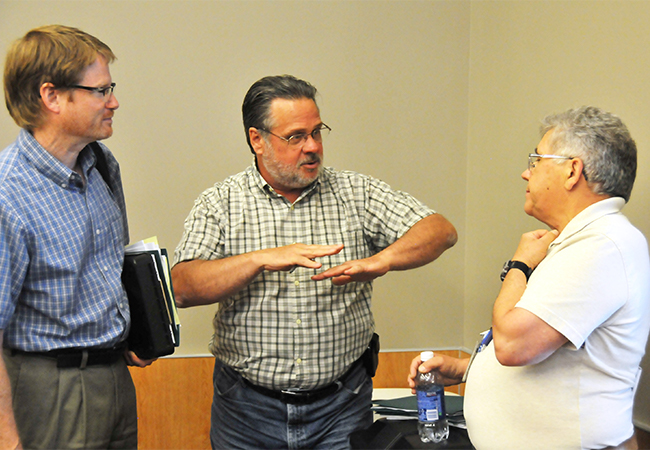 FEMA official helps local officials.