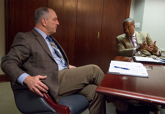 State and Federal officials meet to discuss flood recovery.