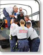 A group of people helping someone
