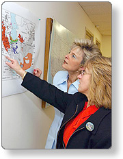 Two Emergency Responders looking at a map