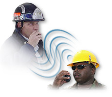 Picture of two men communicating by radio
