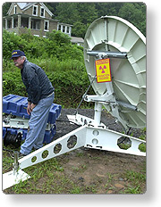 Man establishing satellite communications