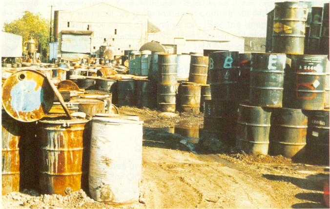 Waste Storage Area with stacked barrel drums