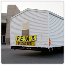 A mobile home arrives at a Hurricane Ike staging area in Beaumont Texas