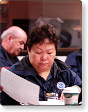 FEMA personnel organizing expenditure receipts
