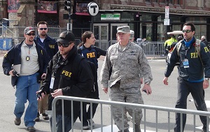 Members of the military and the FBI respond to the explosions at the Boston Marathon.