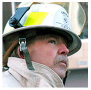 Incident Commander wearing helmet.