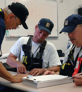 Photo of Incident Commander transferring command.