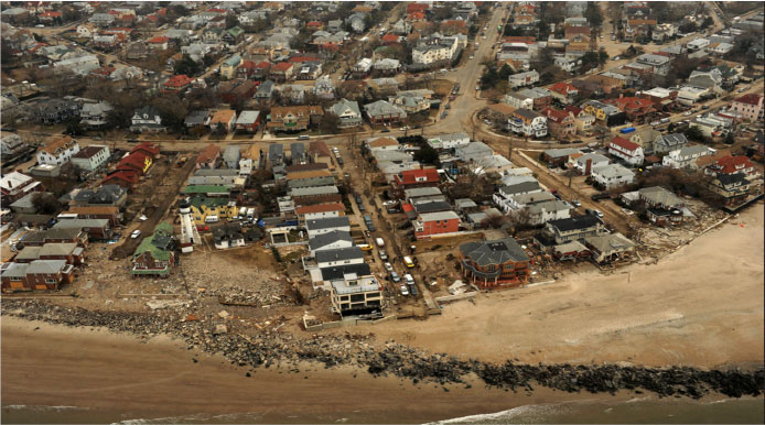 Photo of an aerial view of damage caused by the storm surge of Hurricane Sandy on the coastline of New York, Nov. 2012 (photo credit Jocelyn Augustino, FEMA).