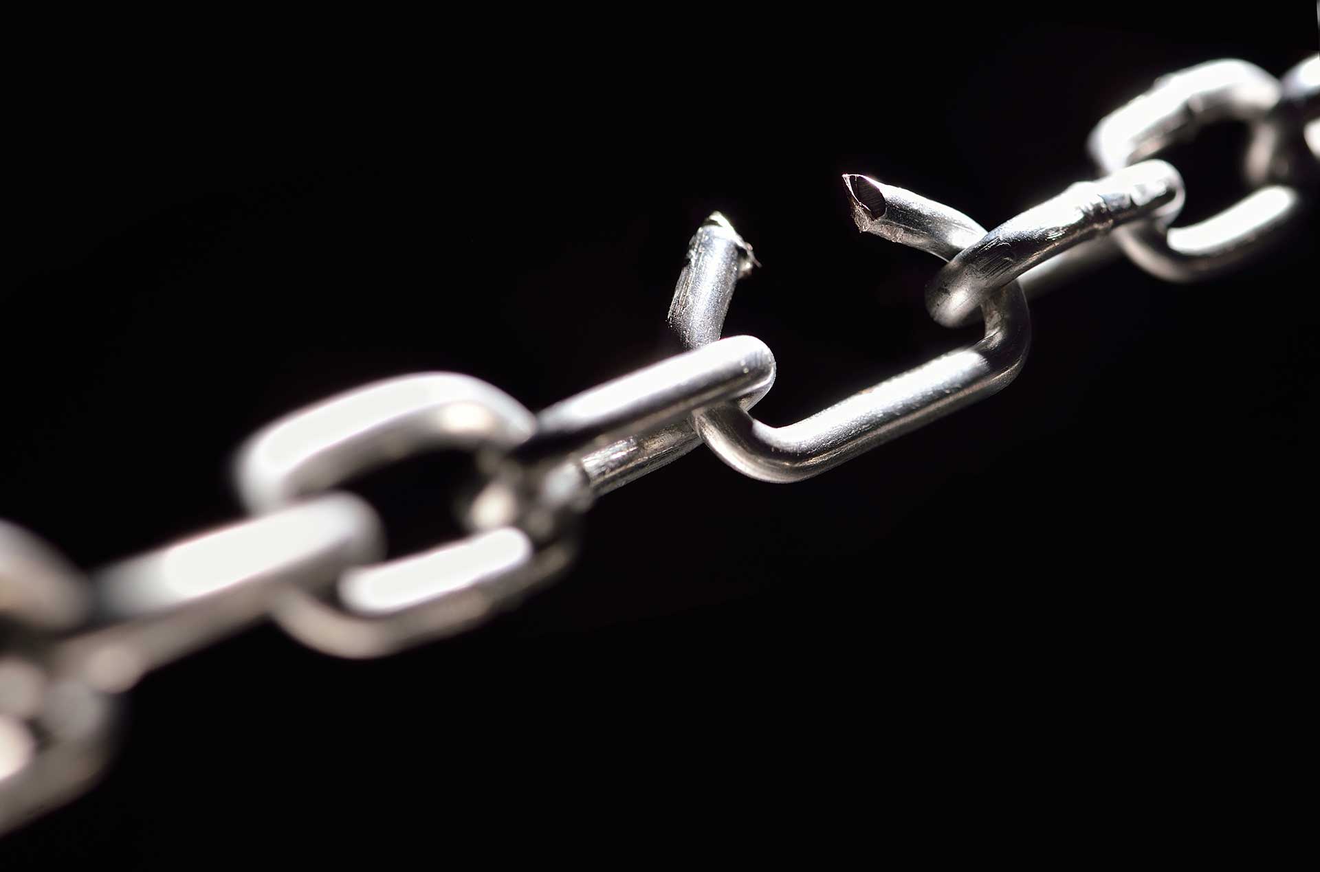 A chain stretch so tight that one of its links is opening