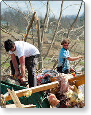 Workers collect debris