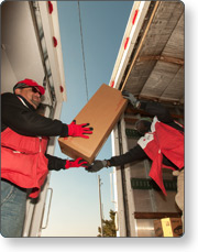 Red Cross volunteers loading a truck