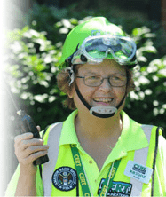 Picture of a CERT volunteer with a two-way radio.