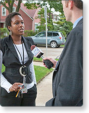 FEMA employee being interviewed by a reporter