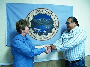 FEMA Federal Coordinating Officer Sandy Coachman shaking hands with the Ramona Band of Cahuilla Indians Tribal Chairman Joseph Domingo Hamilton