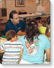 Photo of a family seeking help at a Disaster Recovery Center