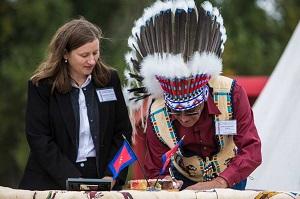 Oglala Sioux Tribal President signing FEMA-Tribal agreement with Acting Regional Administrator.