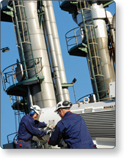 Engineers inside oil and gas refinery
