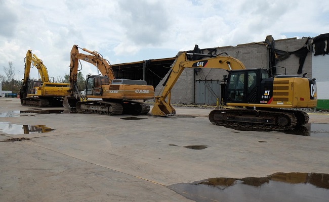 Equipment to help with the demolition of a damaged warehouse