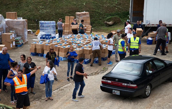 Survivors line up in their cars at Hacienda Moraika, where they'll receive food, water, medical supplies and other needed aid, provided by FEMA.