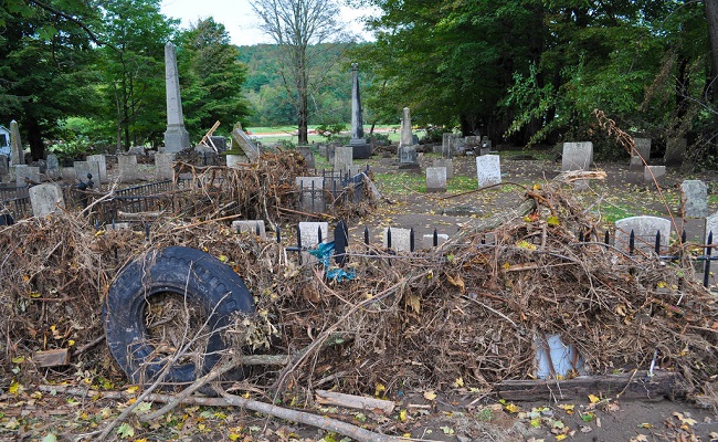 Debris and damage to local cemetery.