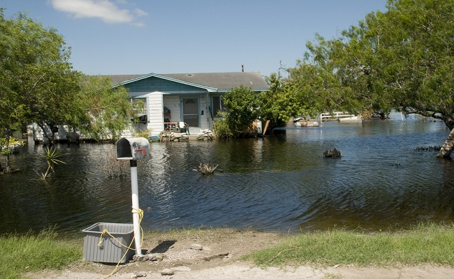 A flooded house in a neighborhood in Texas after Hurricane Harvey.