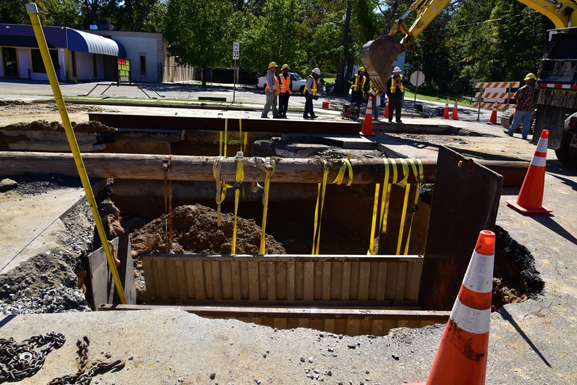 SCDOT workers are fixing a hole caused by flooding on Highway 21 in South Carolina.