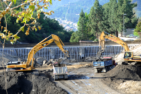 A debris basin at Pickins yard is cleaned after severe winter weather caused flooding and landslides to fill the bowl.