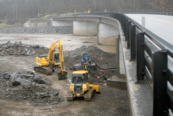 Contractors work on rebuilding the bridge piers damaged by flooding of the Schoharie Creek during Hurricane Irene.