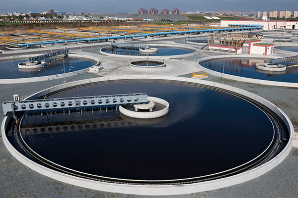 A view over water the water tanks of a sewage treatment plant