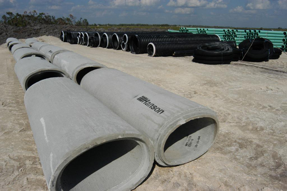 A Staging Area Where Different Types Of Pipe Are Laid Out   126 