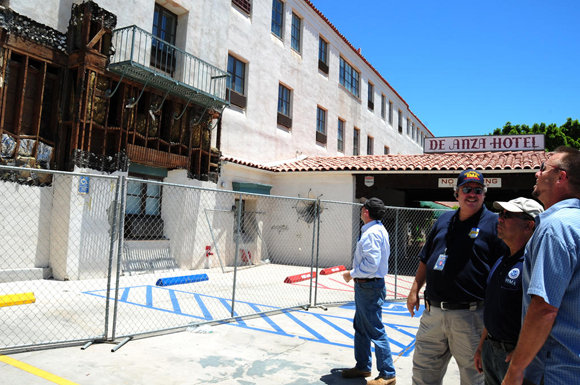 A group from FEMA inspects damage to the De Anza Hotel in Calexico