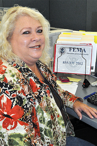 Insurance specialist sitting at her desk