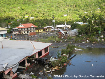 Damage and flooding at the Fagasa Road intersection during the 2009 Samoan tsunami