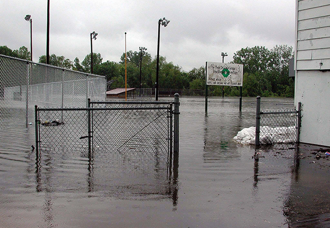 A flooded Little League ball field.