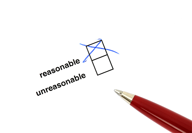 A pen next to a checked box labeled "reasonable" and an unchecked box labeled "unreasonable"