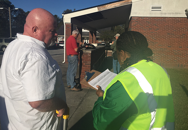 FEMA Public Assistance team performing a site inspection with the facilities manager.