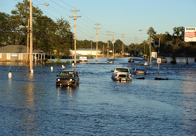 Multiple vehicles stranded in flood waters