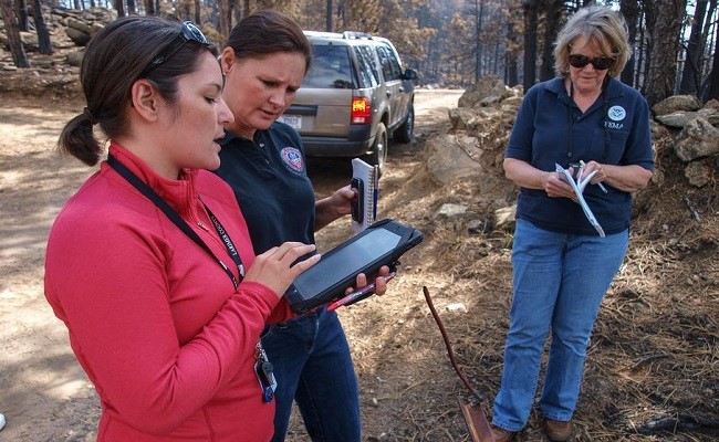 Preliminary Damage Assessment team assessing damage resulting from the High Park Fire in Colorado.