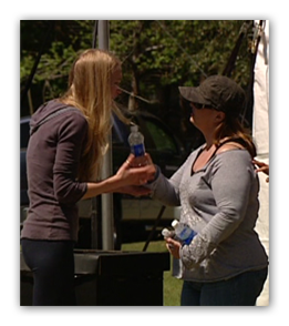 Non-FEMA attire. The individual handing out water did not wear a FEMA badge. 