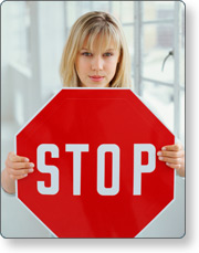 Person holding a stop sign