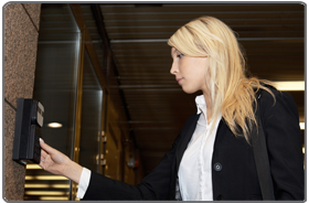 Woman entering a security code.