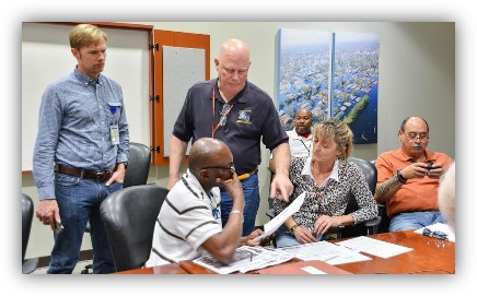 Disaster recovery staff in meeting