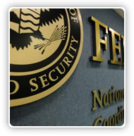 Part of the DHS seal hanging on the wall